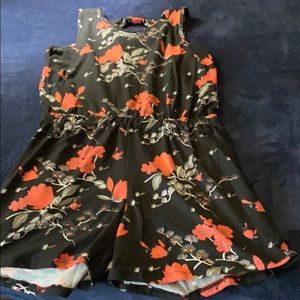 Girl’s size XL Proof Girl floral romper.